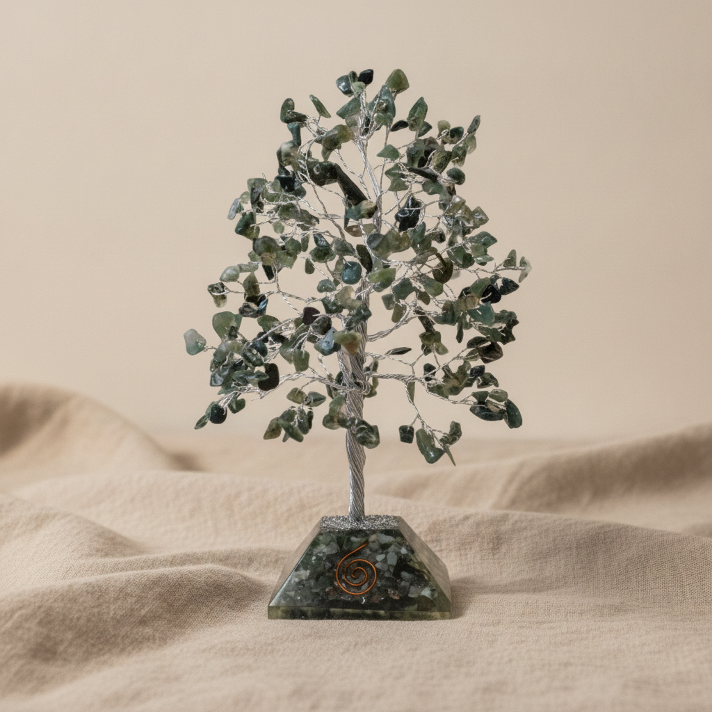 Moss agate chipstone tree on a speckled orgonite base, on rumpled linen