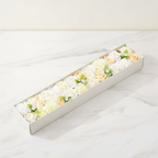 Long box of white and ivory soap roses lying open on cotton canvas - view 2