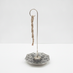 Astamangal rope incense burner, a twisted rope hanging from the hook over the octagonal dish
