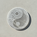Large round selenite charging plate engraved with a feng shui compass