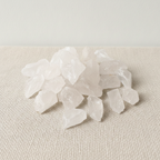 Rough milky quartz chunks piled on cotton canvas - view 3
