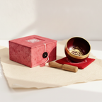 Red chakra singing bowl with its striker, cushion and box, on cotton-rag paper - view 5