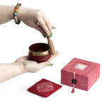 Red chakra singing bowl with its striker, cushion and box, on cotton-rag paper - view 4