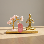 Rose quartz tree with namaste yoga figure on oak