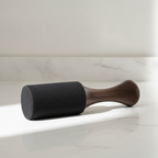 Large wooden king stick gong and singing bowl mallet on marble